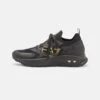 EA7 Emporio Armani ALTURA UNISEX - Sneaker Low - Triple Black/gold